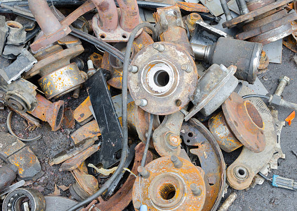 Useless, worn out rusty brake discs and other parts