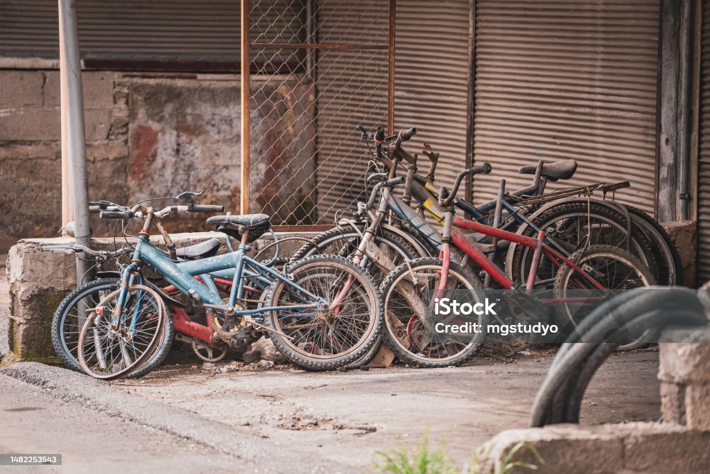 Pile of old bikes at a scrap yard